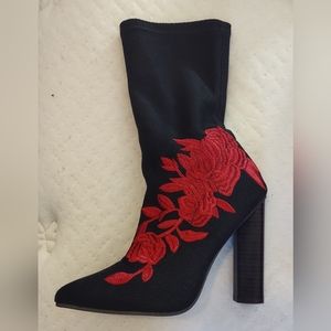 Black booties with red embroidered roses